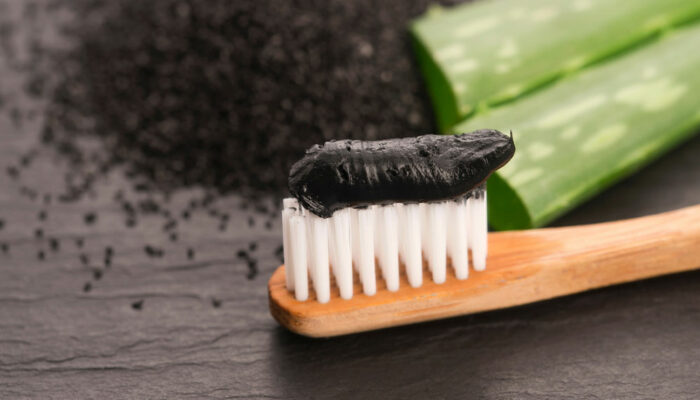 Consider these pros and cons before using charcoal toothpaste